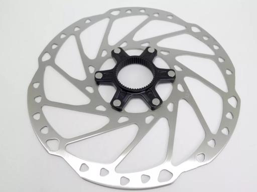 Shimano DEORE SM-RT64 brzdový kotouč 203mm Center Lock + závěrná matice